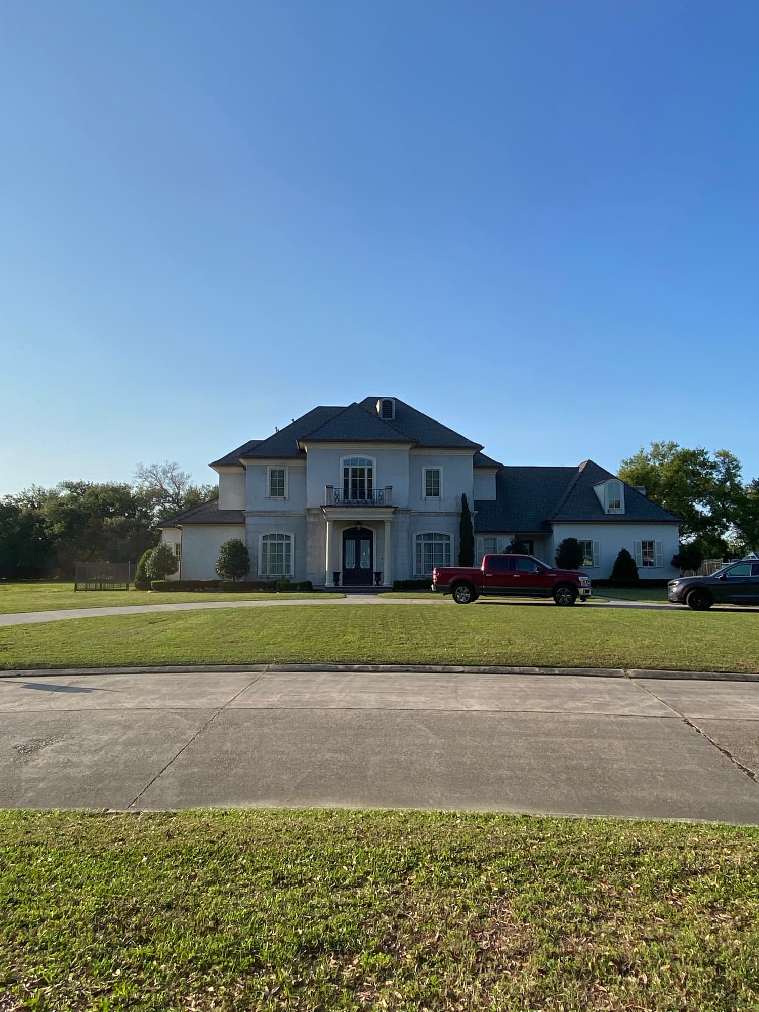 Two-story commercial building with grounds maintained by TIMCO