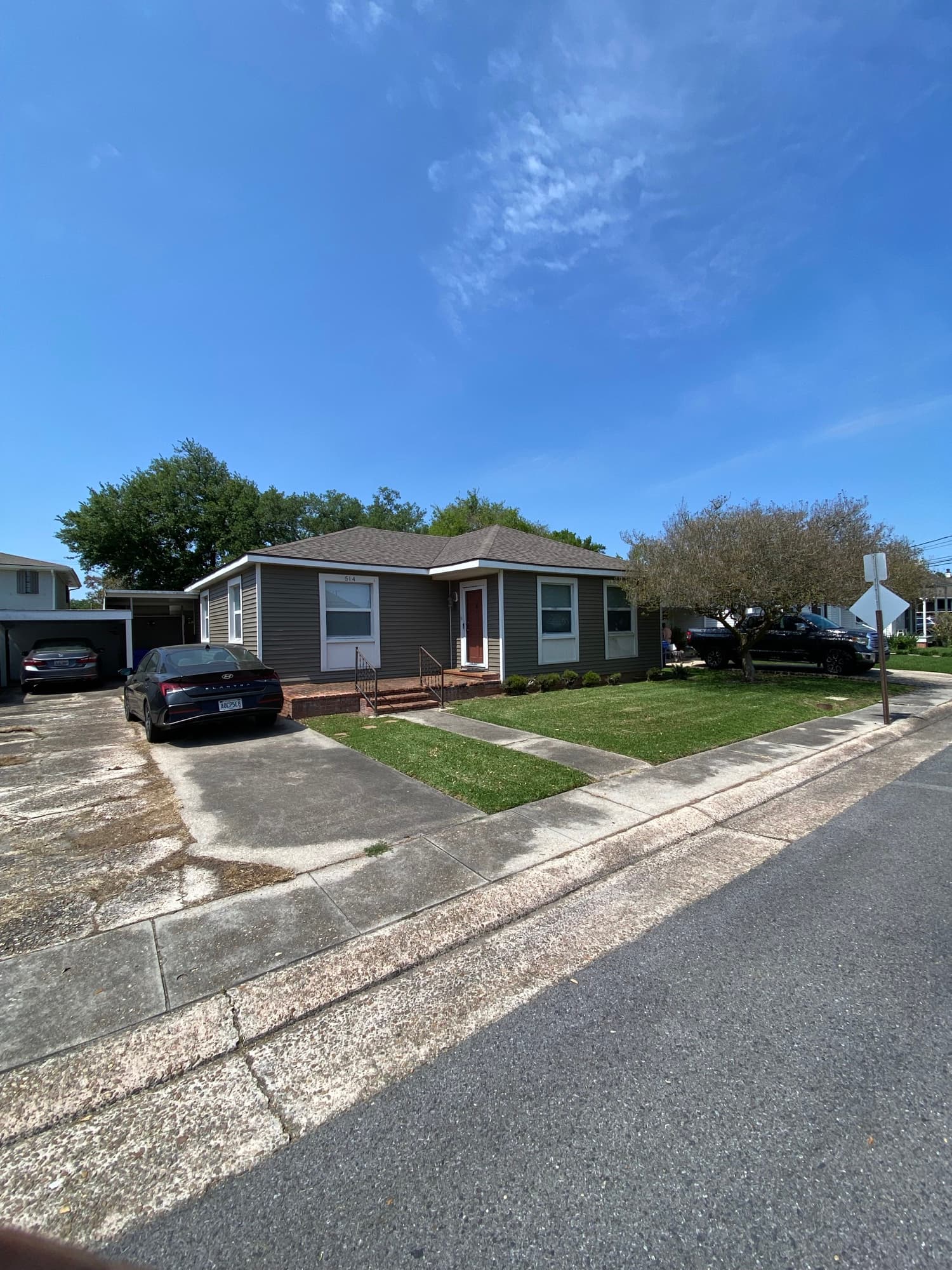 Maintained home with cleared yard and TIMCO truck